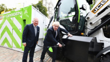 Pictured: JCB chair Lord Bamford accompanying Prime Minister Boris Johnson on a site visit in October. Image: JCB